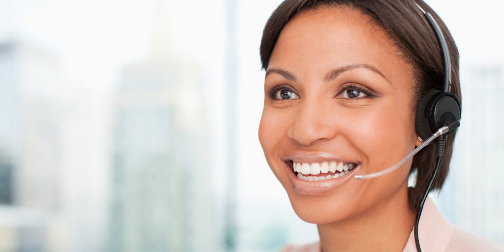 Smiling businesswoman in headset